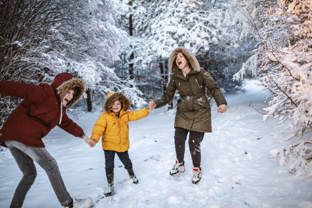 istock Family fun on a snowy winter day 1205948692