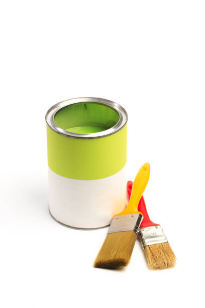 istock Can with green paint with brush  isolated on white background - Image 1205948973
