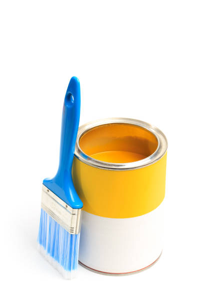 istock Can with yellow paint with brush isolated on white background - Image 1205949182