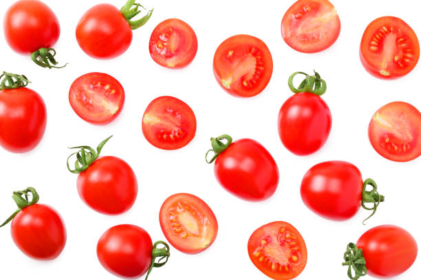 istock fresh tomato with slices isolated on white background. top view 1205949888