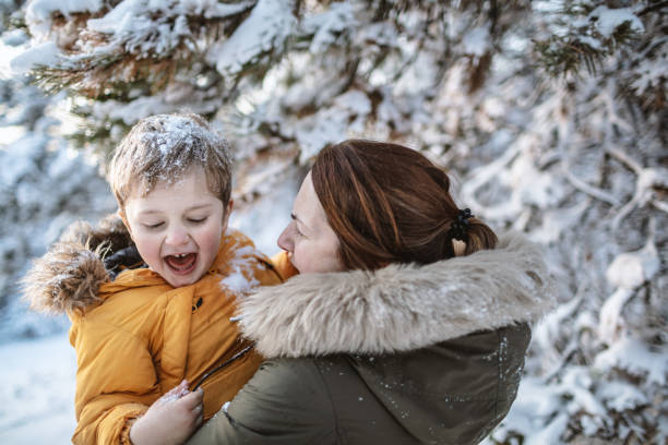 istock Fun on the snow with my mum 1205950076