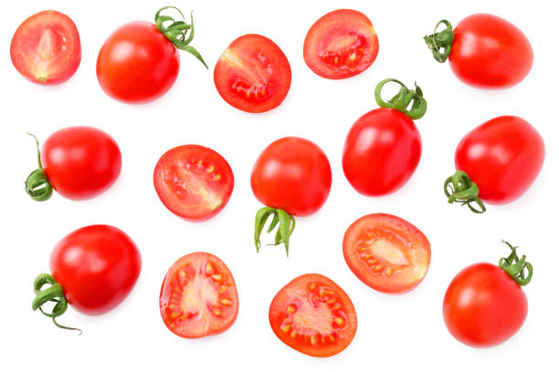 istock fresh tomato with slices isolated on white background. top view 1205950317