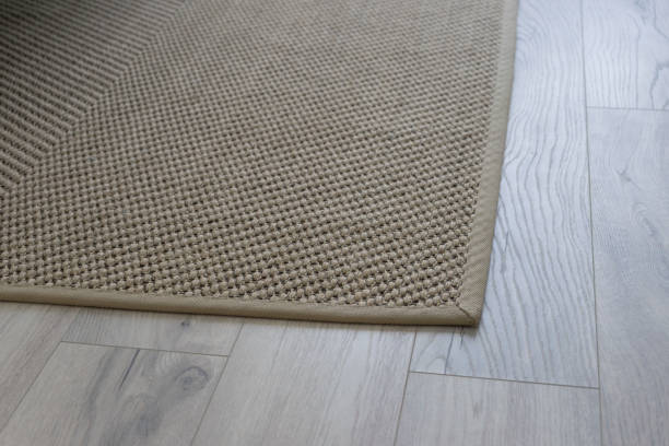 istock Carpet and blue bench in bedroom by the window. 1205950419