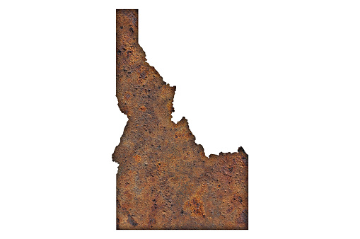 Map of Idaho on rusty metal