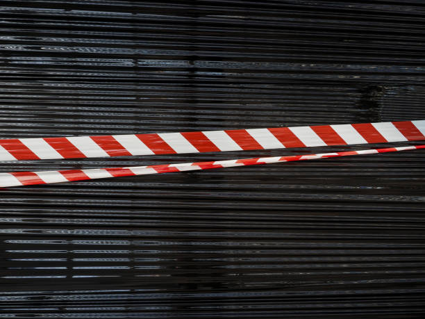 istock red and white barrier tape 1205953605