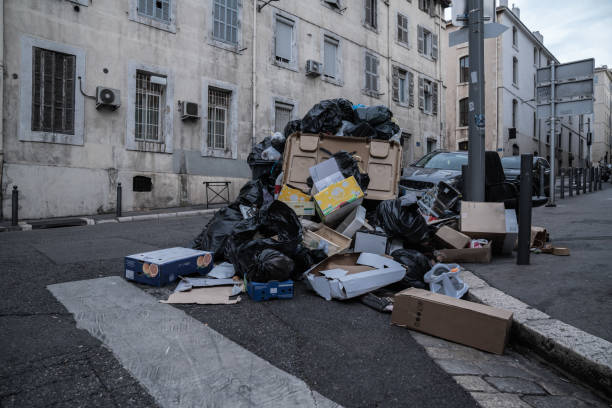 istock household trash piled on street - Stike Protest action 1205956149