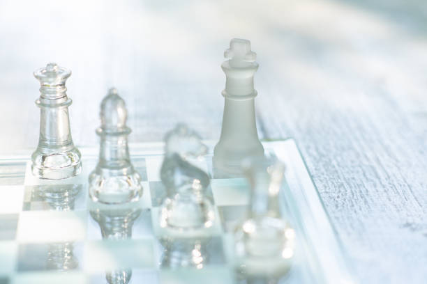 istock Chess board game made of glass, business competitive concept, copy space 1205961959