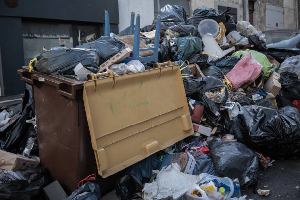 istock household trash piled on street - Stike Protest action 1205962296