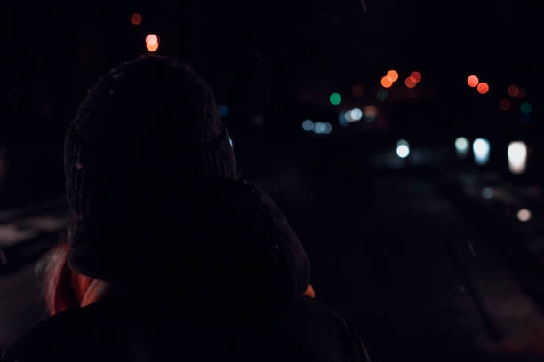 istock young woman in night 1205966634