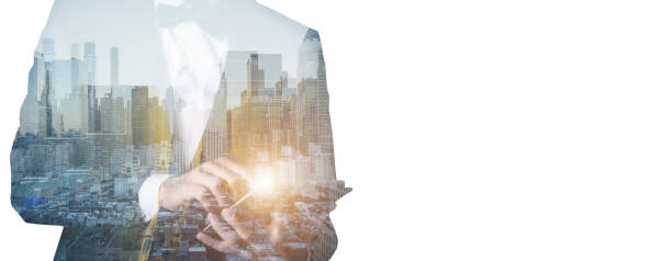 istock Double exposure of city and Businessman use Tablet device 1205967667