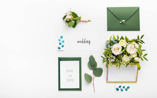 istock Greeting Cards Papers Lying on Table Decoration With flowers 1205978140