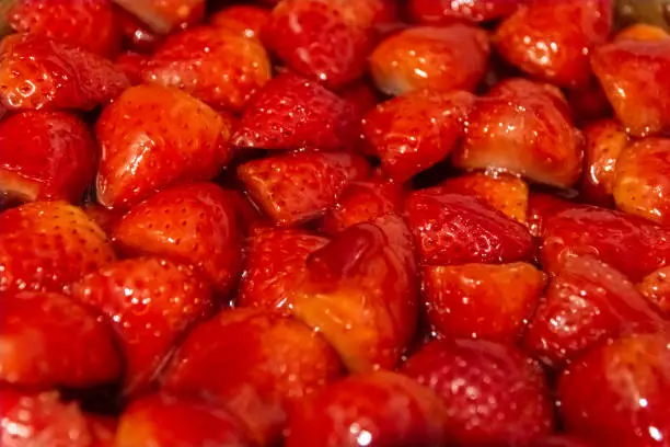 freshly cut red strawberries in close-up