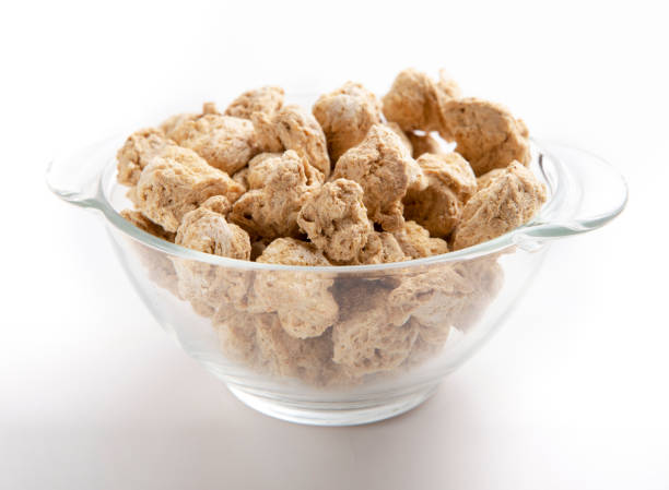 istock Soy meat in glass bowl on while background 1205979659
