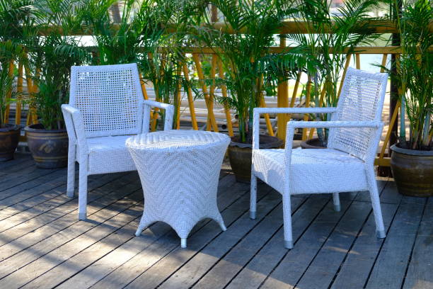 Wicker weave outdoor Plastic furniture white color. stock photo
