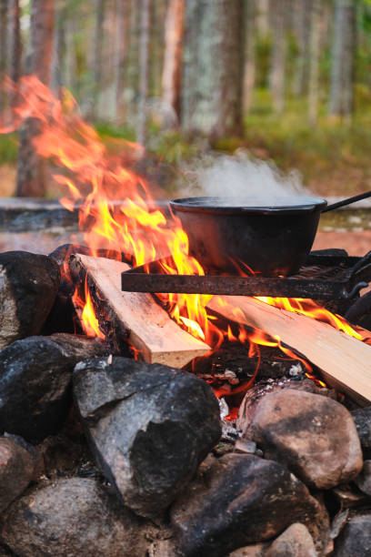 istock Cooking at the campfire traditional dish. 1205986269