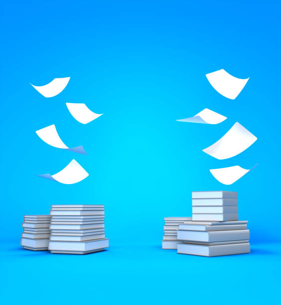 istock The white paper falling onto the stack of books 1205986646
