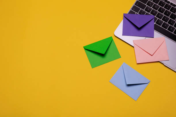 Close-up of envelopes on laptop