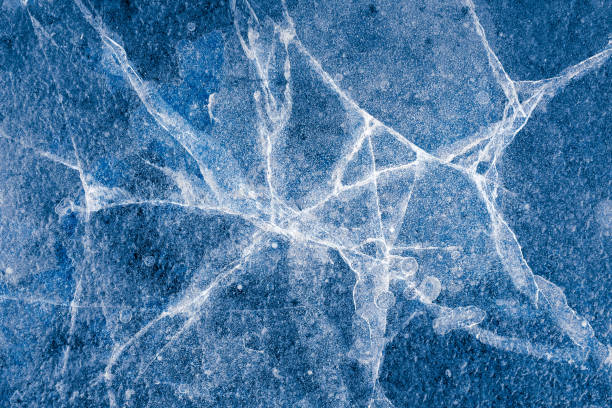 istock ice. texture of frozen water 1205990095