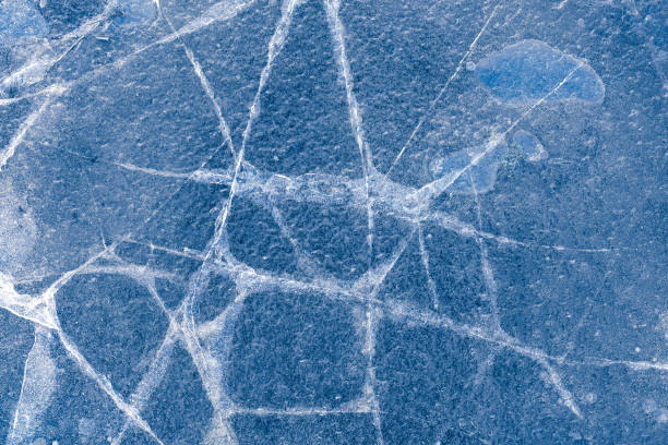 istock ice. texture of frozen water 1205990264