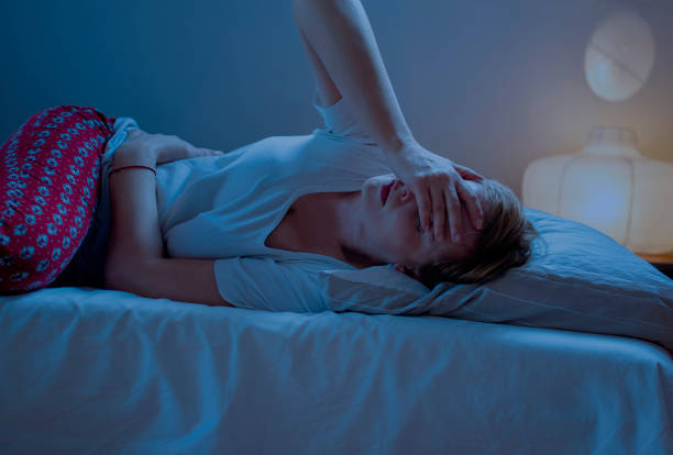 istock Woman Feeling Strong Abdominal Pain at night 1205991686