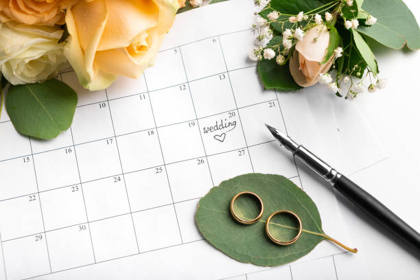 istock Two golden rings for couple on creative background 1205991748