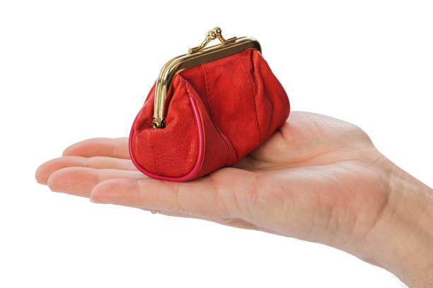 istock Hand of old man and purse 1206000803