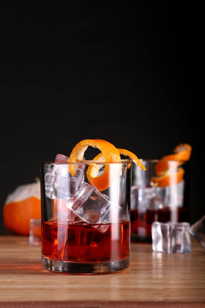istock Chilled Alcohol Whisky / Rum Drink with Ice Cube and Orange Peel 1206002595