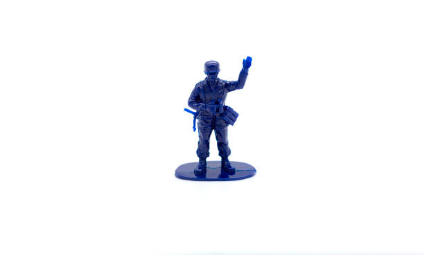 istock A blue colored toy soldier on a white background 1206003267