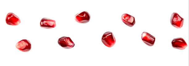 istock Pomegranate. Fresh raw seeds of fruit isolated on white background. 1206004667