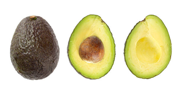 全体の熟したアボカドフルーツと白い背景に分離された連続で2つの半分。 - avocado portion brown apple core ストックフォトと画像