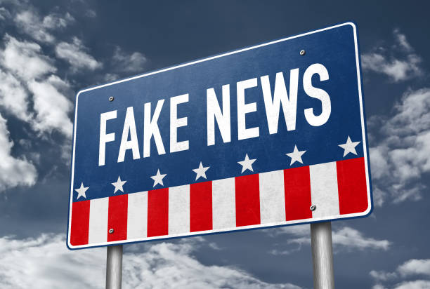 istock Fake News - road sign message 1206007405