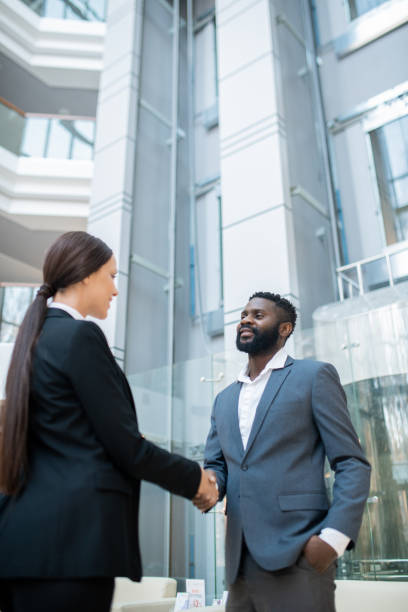 istock Shaking hand of young business lady 1206008277