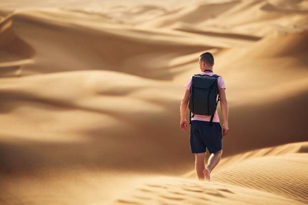 istock Tourist in desert 1206009939