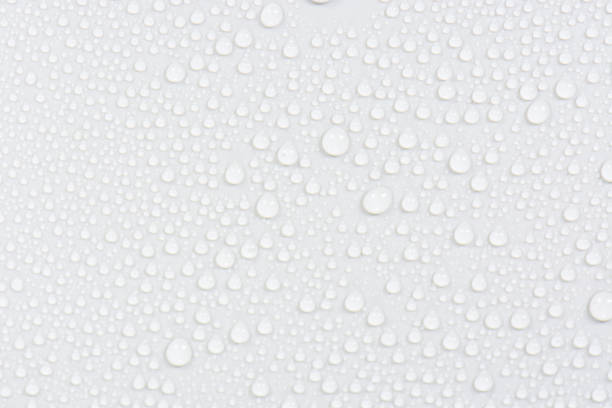 Close up water drops on black tone background. Abstract white gray wet texture with bubbles on plastic PVC surface or grunge. Realistic pure water droplets condensed. Detail of canvas leather texture