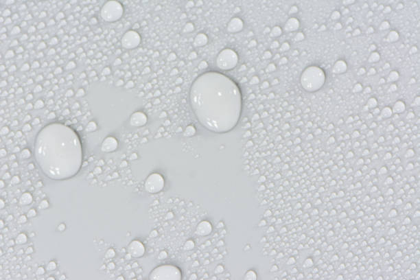 istock Close up water drops on black tone background. Abstract white gray wet texture with bubbles on plastic PVC surface or grunge. Realistic pure water droplets condensed. Detail of canvas leather texture 1206020693