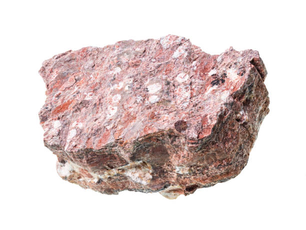 unpolished rhyolite rock cutout on white unpolished rhyolite rock cutout on white background rhyolite rock stock pictures, royalty-free photos & images