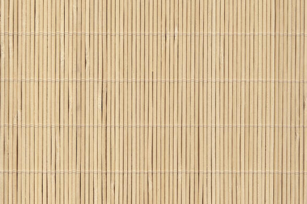 High Resolution Bamboo Place Mat Rustic Slatted Interlaced Coarse Grain Background Texture High Resolution Photograph of Bamboo Place Mat Rustic Slatted Interlaced Coarse Grain Background Texture. beach mat stock pictures, royalty-free photos & images