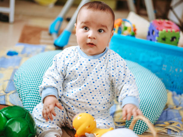 istock Baby playing with toys 1206023769