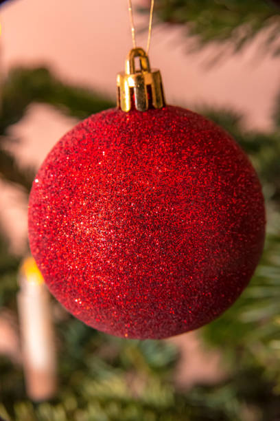 istock Red Christmas tree ball on a Christmas tree 1206024014