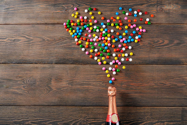 istock Chocolate balls in sugar shell and champagne. 1206024566