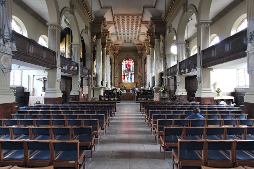 People visit Saint Philip's Cathedral in Birmingham, UK. It is the Church of England cathedral and the seat of the Bishop of Birmingham.