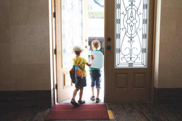 istock Kids going to the first day of school 1206026703