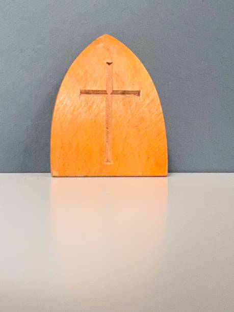 istock Crucifix on wooden block 1206026939