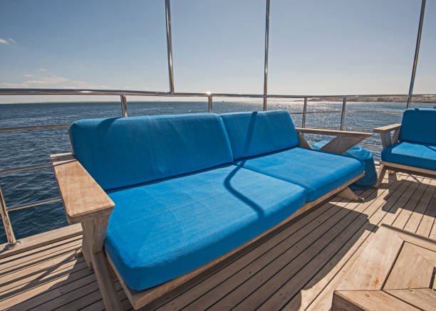istock Table and chairs on deck of a luxury motor yacht 1206027096