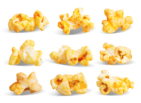 Spiced popcorn with cheese or bacon flavor. Collection of ready-to-eat popcorn isolated on white background with clipping path