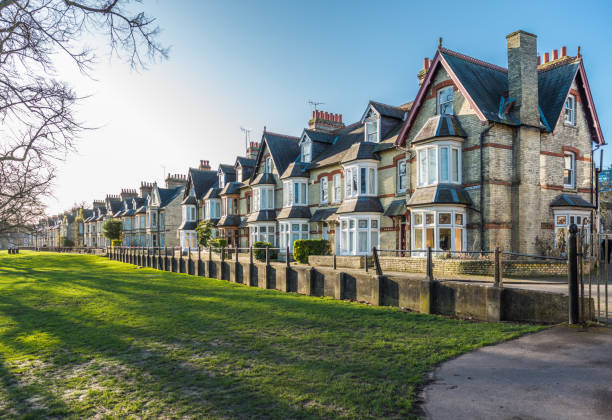 Characterful terraced houses on Park Parade Characterful terraced houses on Park Parade facing Jesus Green in the city of Cambridge, UK. cambridgeshire stock pictures, royalty-free photos & images