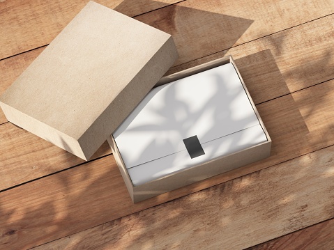 Opened carton Gift Box Mockup with white wrapping paper on the wooden table outdoor. 3d rendering