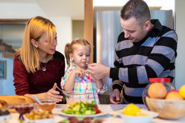 istock Mother, father and daughter. 1206041112
