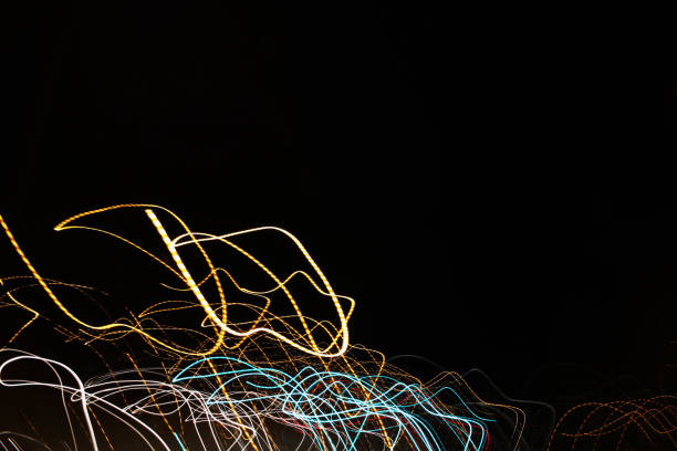 Colorful abstract line light art with black background. Conceptual art showing motion, pulse of the city of Helsinki & darkness of the night. Created by moving camera with long exposure.