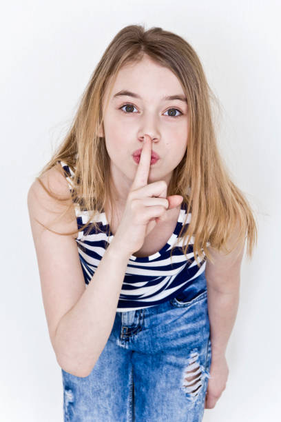istock Cute girl with blond long hair on white 1206044331